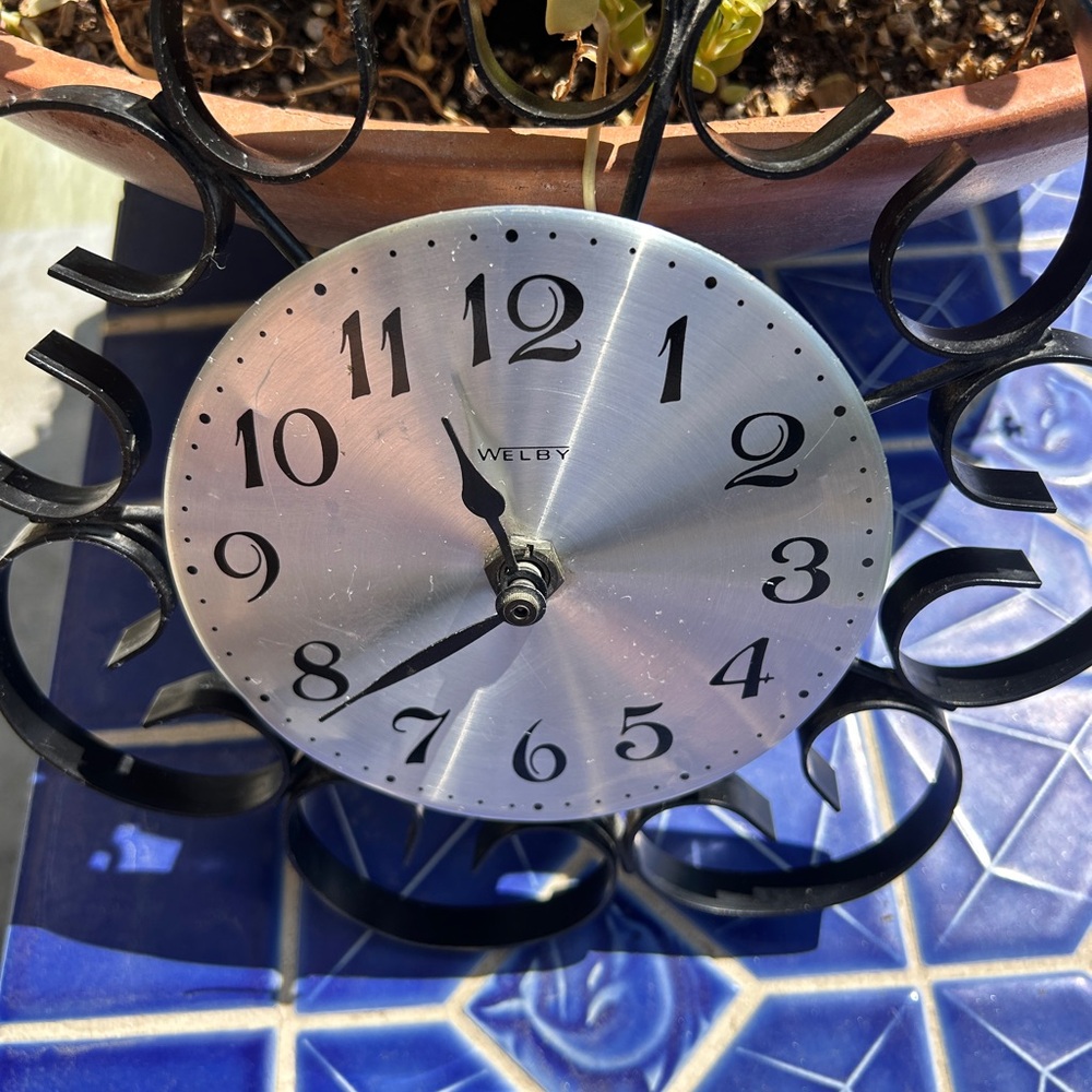 Elegant Silver and Black Wall Clock